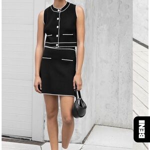 Black Sleeveless Dress with White Trim